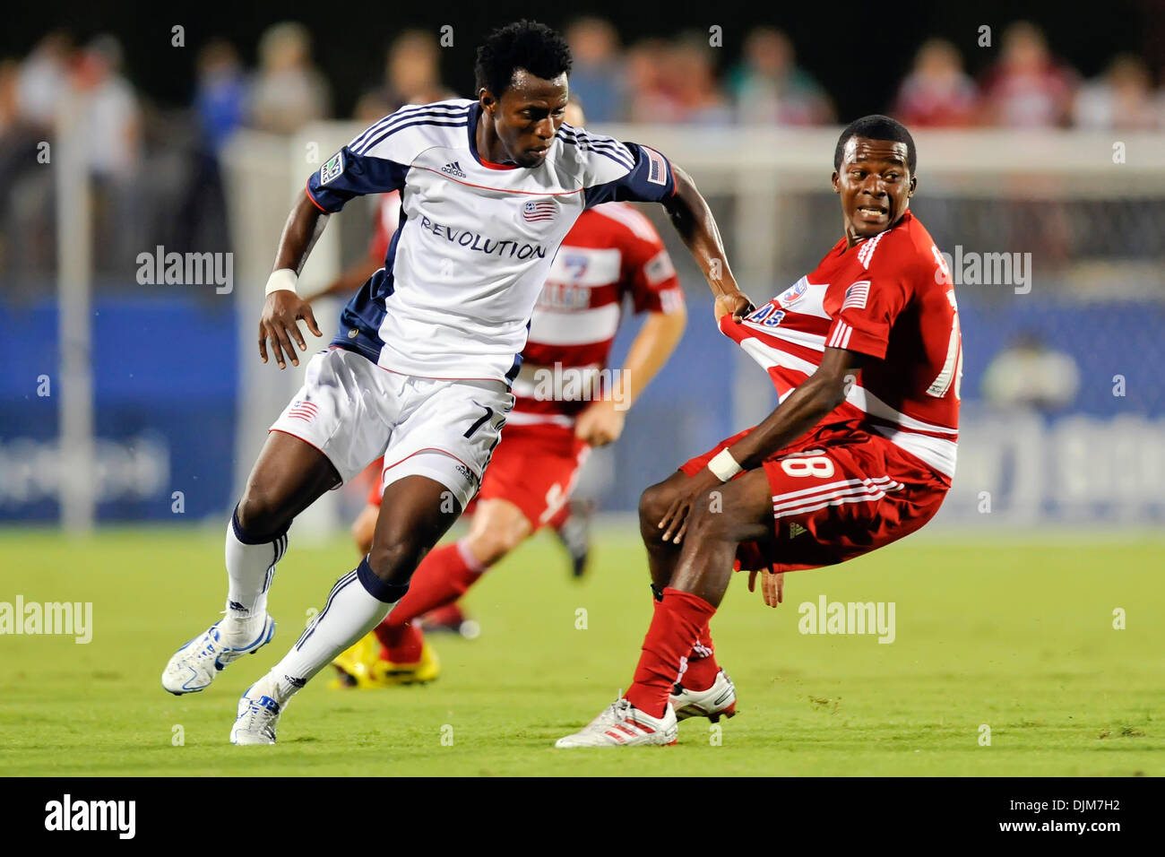 Sept. 22, 2010 - Frisco, Texas, United States of America - New England Revolution midfielder/forward Kenny Mansally (7) fights for position against FC Dallas midfielder Marvin Chavez (18) as FC Dallas's unbeaten streak is extended to 16 games as FC Dallas scores in stoppage time earning a draw with the New England Revolution at Pizza Hut Park in Frisco, Texas. (Credit Image: © Stev Stock Photo