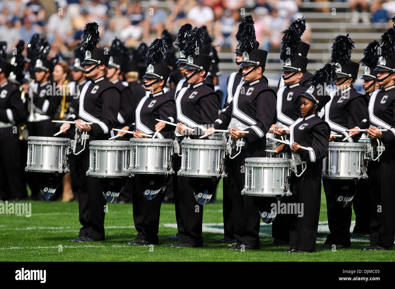 Sept. 25, 2010 - East Hartford, Connecticut, United States of America - The UConn Marching Band Drumline performs during pre game festivities. UConn defeated Buffalo 45 - 21 at Rentschler Field. (Credit Image: © Geoff Bolte/Southcreek Global/ZUMApress.com) Stock Photo