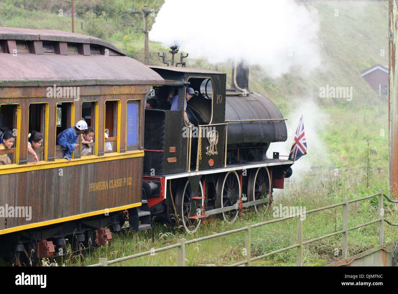 Engine driver reversing a historic steam train at Paranapiacaba station; near Sao Paulo, Brazil. Stock Photo