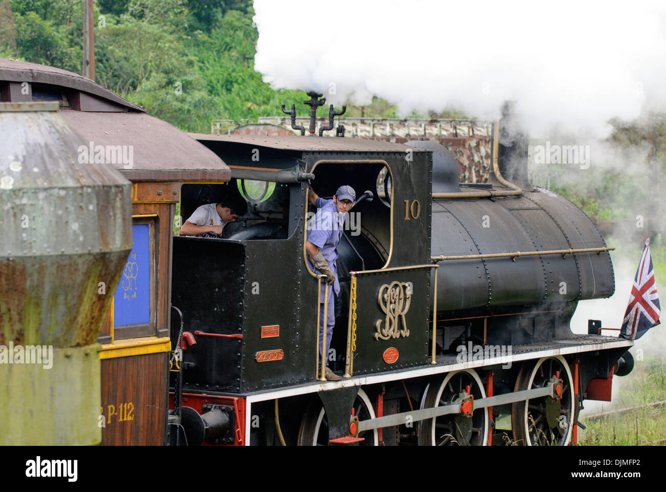 Engine driver reversing a historic steam train at Paranapiacaba station ...