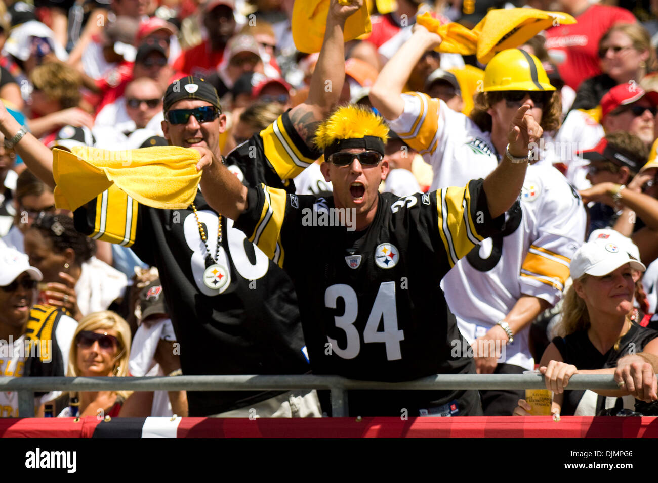 Sep. 26, 2010 - Tampa, Florida, United States of America - Pittsburgh Steelers fanatics cheering their team on against the Tampa Bay Buccaneers. The Tampa Buccaneers fall to the Pittsburgh Steelers 38-13 at Raymond James Stadium in Tampa, Florida. (Credit Image: © Anthony Smith/Southcreek Global/ZUMApress.com) Stock Photo