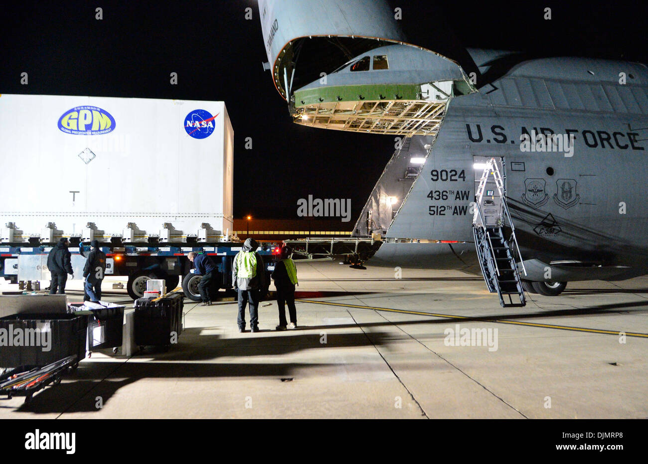 A Global Precipitation Measurement Satellite is carefully loaded into a C-5M Super Galaxy Nov. 20, 2013, at Joint Base Andrews, Stock Photo