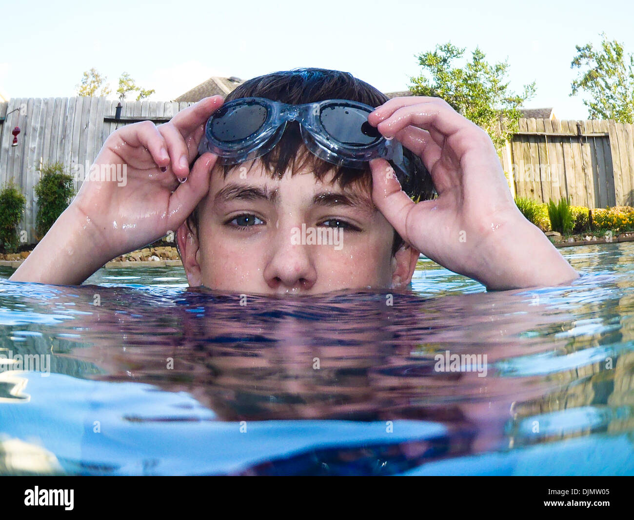 Boy posing near the swimming pool - PixaHive
