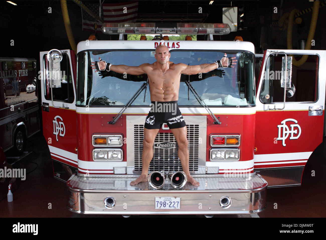 Jul 02, 2010 - Dallas, Texas, U.S. - Mixed Martial Arts fighters BRIAN COX, who is also Dallas firefighters/paramedics, pose in the apparatus room of Dallas Fire-Rescue Station No. 8.  (Credit Image: © Robert Hughes/ZUMAPRESS.com) Stock Photo