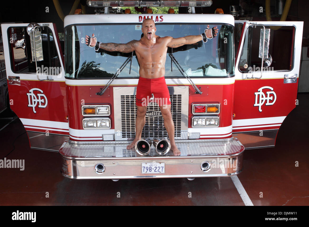 Jul 02, 2010 - Dallas, Texas, U.S. - Mixed Martial Arts fighters BRAD COX, who is also Dallas firefighters/paramedics, pose in the apparatus room of Dallas Fire-Rescue Station No. 8.  (Credit Image: © Robert Hughes/ZUMAPRESS.com) Stock Photo