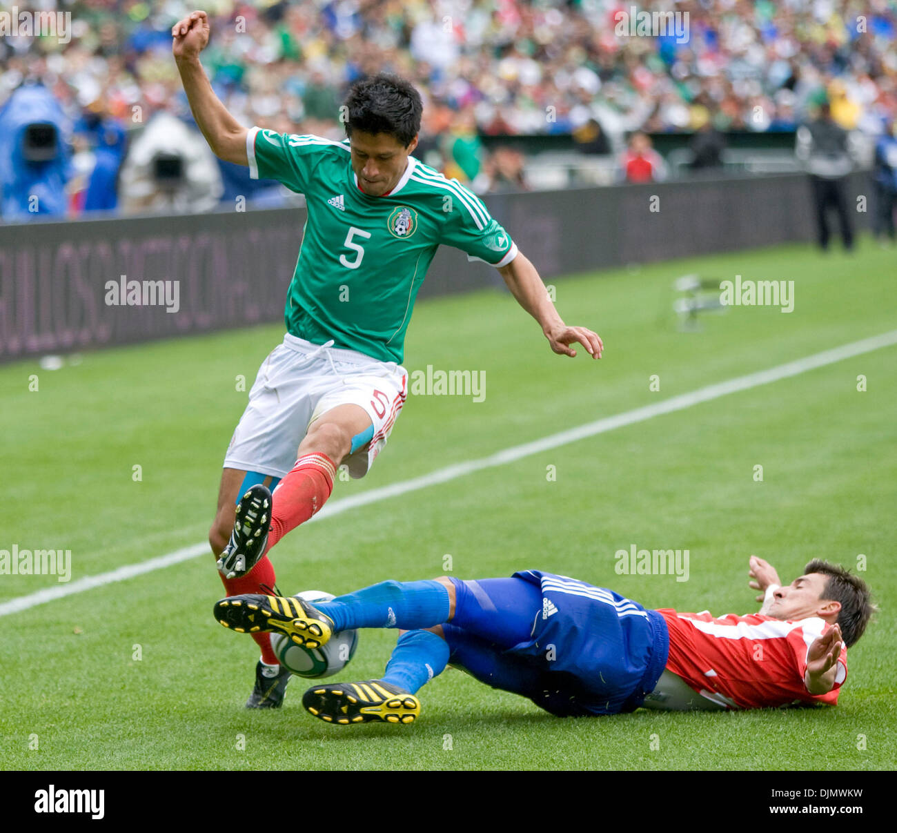 Sept. 12, 2010 - Oakland, California, U.S. - Defender RICARDO OSORIO #5 tries to maintain control of the ball during the FIFA friendly match between Mexico and Paraguay. (Credit Image: © William Mancebo/ZUMAPRESS.com) Stock Photo