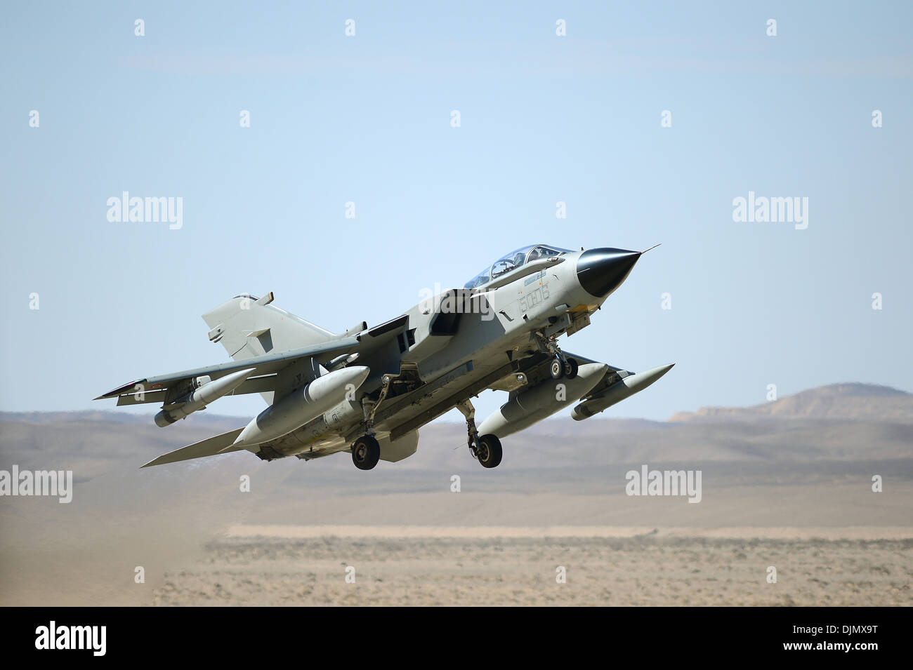 An Italian Air Force Tornado takes off from Uvda Air Force Base, Israel during the Blue Flag exercise Nov. 26, 2013. Aircraft from the 492nd Fighter Squadron, Royal Air Force Lakenheath, deployed to participate in the exercise, which promoted improved ope Stock Photo