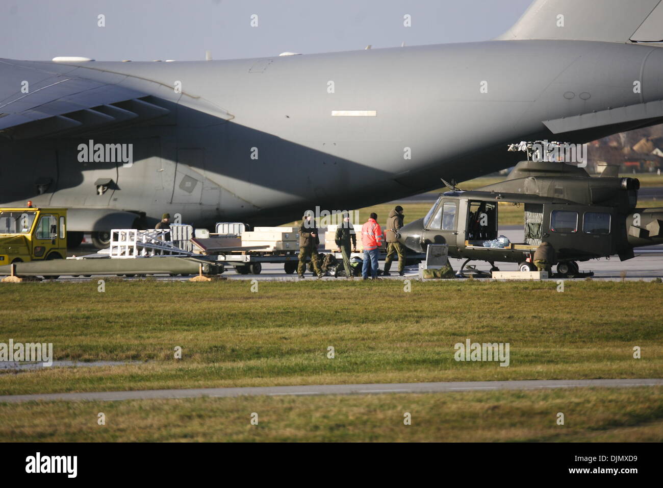 Gdansk, Poland 29th, November 2013 Loading two miliotary Bell 412 helicopters on the giant American transport aircraft  Boeing C-17 Globemaster board at the Gdansk Lech Walesa Airport. Credit:  Michal Fludra/Alamy Live News Stock Photo
