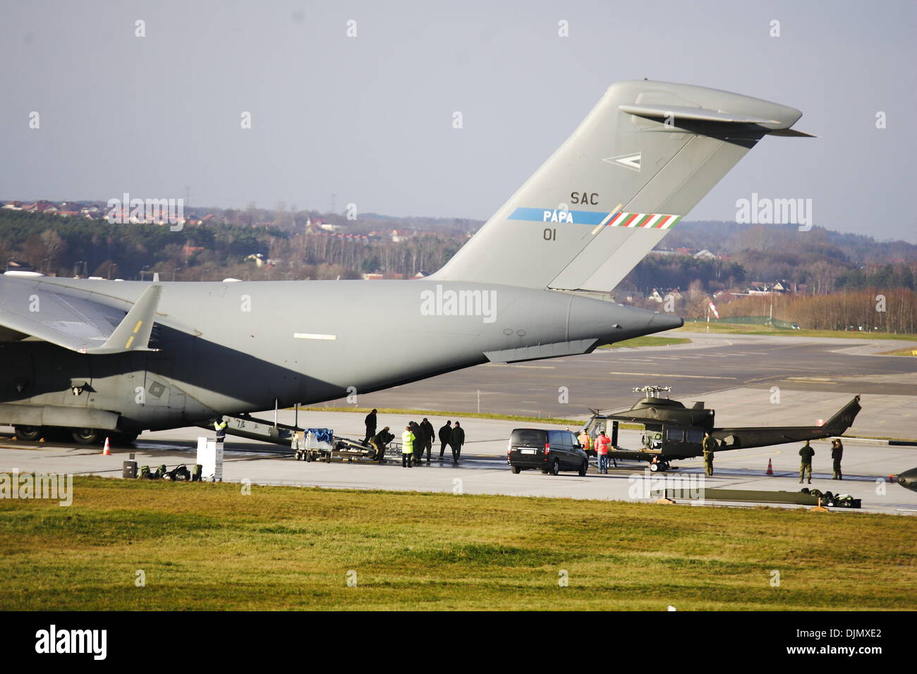 Gdansk, Poland 29th, November 2013 Loading two miliotary Bell 412 helicopters on the giant American transport aircraft  Boeing C-17 Globemaster board at the Gdansk Lech Walesa Airport. Credit:  Michal Fludra/Alamy Live News Stock Photo