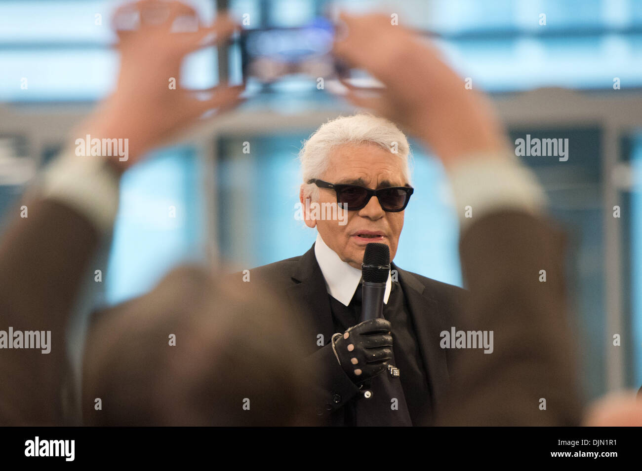 Berlin, Germany. 29th Nov, 2013. Fashion designer Karl Lagerfeld acts as editor-in-chief for the 01 December 2013 edition of Welt am Sonntag and takes part in a editors' conference in Berlin, Germany, 29 November 2013. Photo: MAURIZIO GAMBARINI/dpa/Alamy Live News Stock Photo