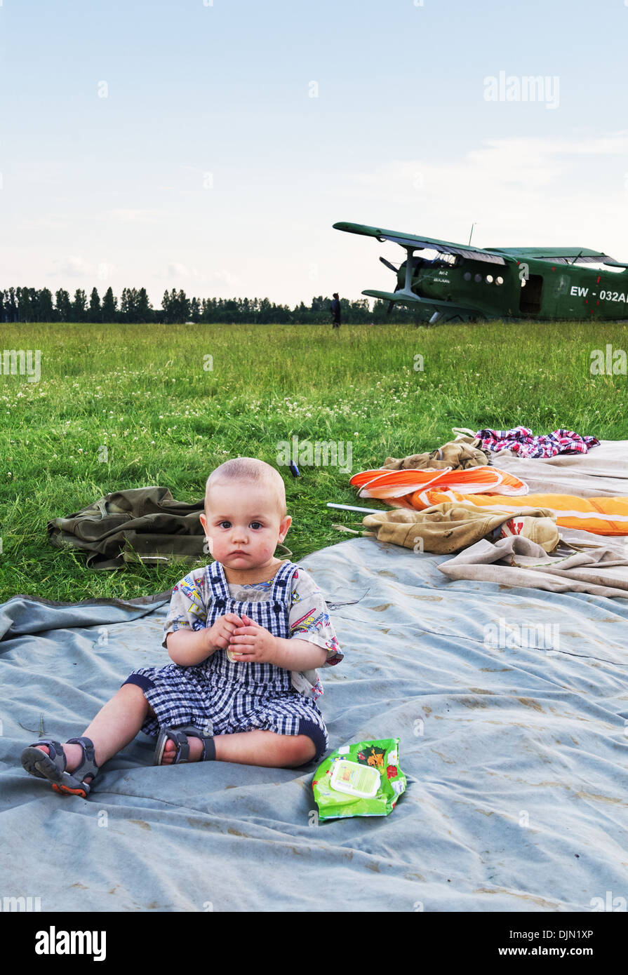 Small child in overalls hi-res stock photography and images - Alamy