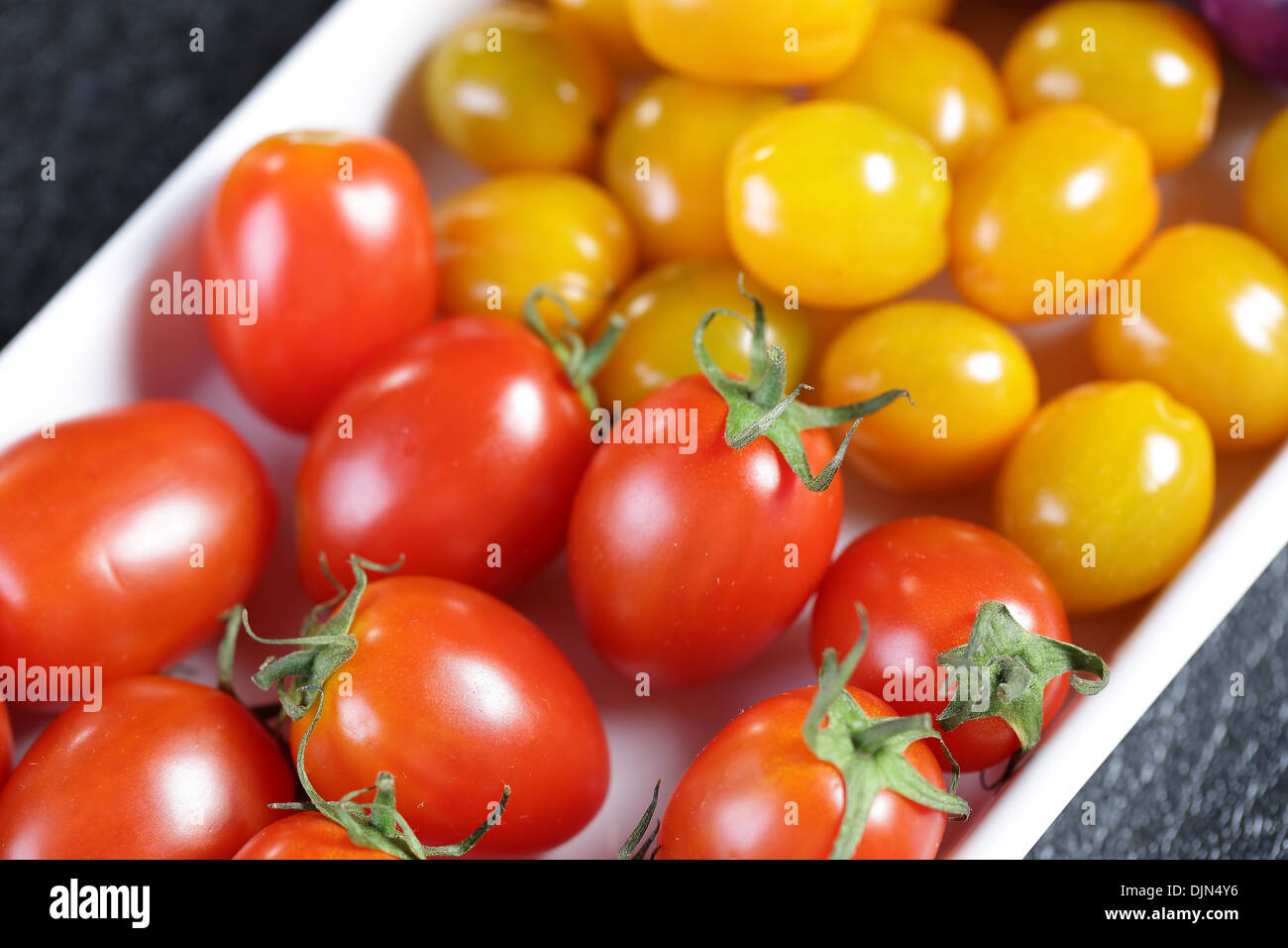 Close up Red tomatoes with another vegether Stock Photo
