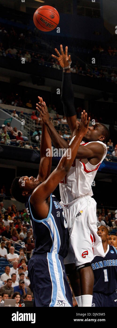 Mar 23, 2008 - Tampa, Florida, USA - Western Kentucky forward Boris Siakam (21) goes up to take a shot while being guarded by San Diego forward  Gyno Pomare (21). College Basketball: San Diego Toreros against the Western Kentucky Hilltoppers during second half action of NCAA second round action at the St. Pete Times Forum in Tampa. the 12th-seeded Hilltoppers advanced to the Sweet  Stock Photo