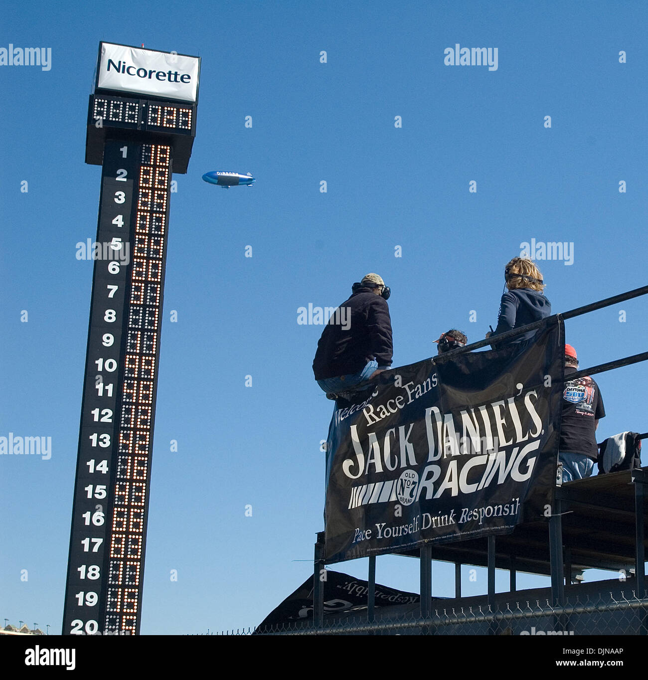 Mar 09, 2008 - Hampton, Georgia, USA - Fans watch the running of the Kobalt Tools 500 at Atlanta Motor Speedway on Sunday, March 9, 2008 as the Direct TV blimp flies overhead. (Credit Image: © Timothy L. Hale/ZUMA Press) Stock Photo