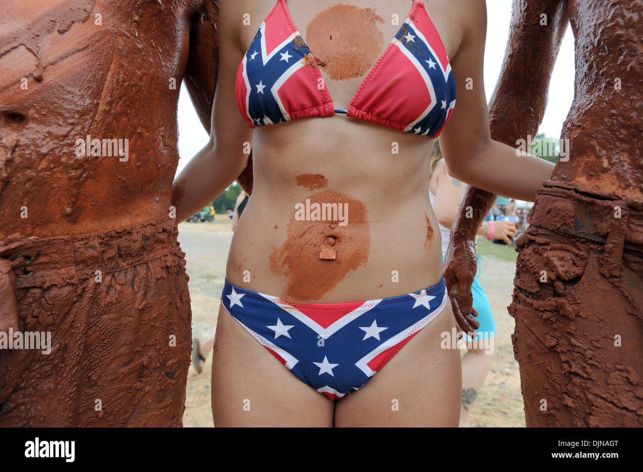 Mar 11, 2008 - East Dublin, Georgia, USA - Megan Lever sports a Confederate Battle Flag navel ring and bikini while attending the 13th annual Summer Redneck Games at Buckeye Park in East Dublin, Georgia, on Saturday. The annual homage to Southerners, began as a spoof to the 1996 Summer Olympics in Atlanta. Thousands of revelers attend the event whose events include bobbing for pigs Stock Photo