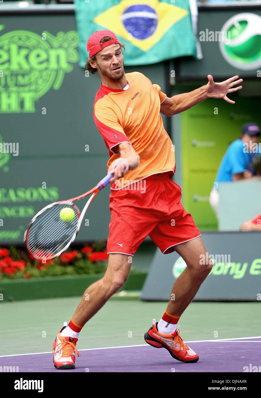 Mar 26 2008 Key Biscayne Florida USA GUSTAVO KUERTEN of Brazil hits a forehand return against his first round opponent Sebastian Grosjean of France during the 2008 Sony Ericsson at
