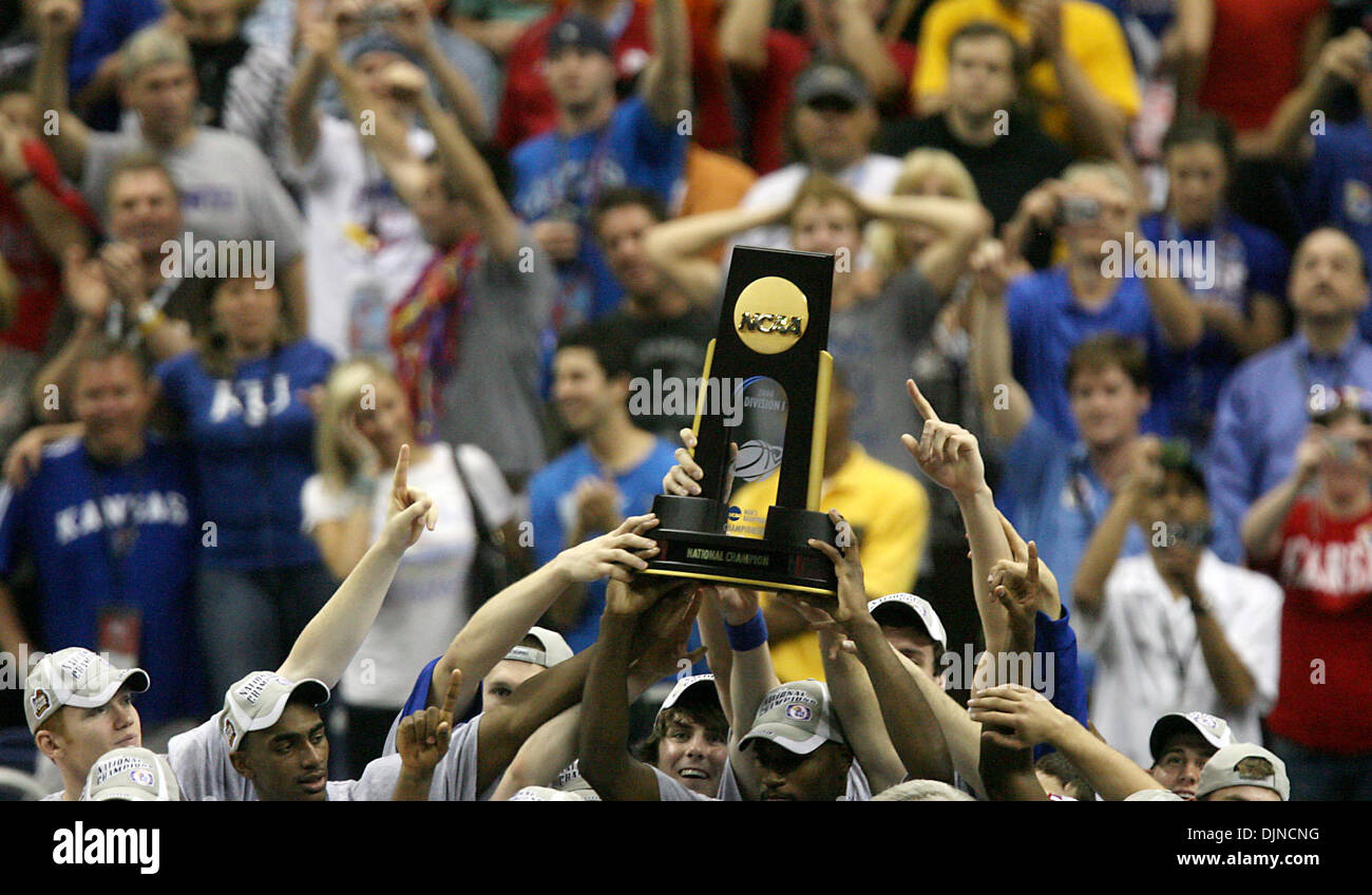 Apr 07, 2008 - San Antonio, Texas, USA - Kansas players hold up the National Championship Trophy following their OT 75-68 win. Memphis v. Kansas, NCAA basketball championship game at the Alamodome in San Antonio. (Credit Image: © Delcia Lopez/San Antonio Express-News/ZUMA Press) RESTRICTIONS: * San Antonio, Seattle Newspapers and USA Tabloids Rights OUT * Stock Photo