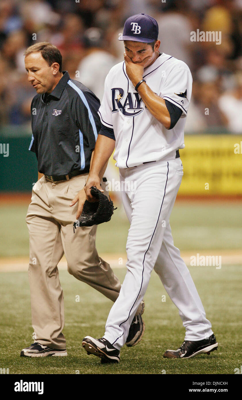 Apr 08, 2008 - St. Petersburg, Florida, USA - Head Athletic Trainer RON PORTERFIELD, left, leaves with Rays pitcher MATT GARZA, 22 in the third after Garza developed radial nerve irritation. (Credit Image: Stock Photo