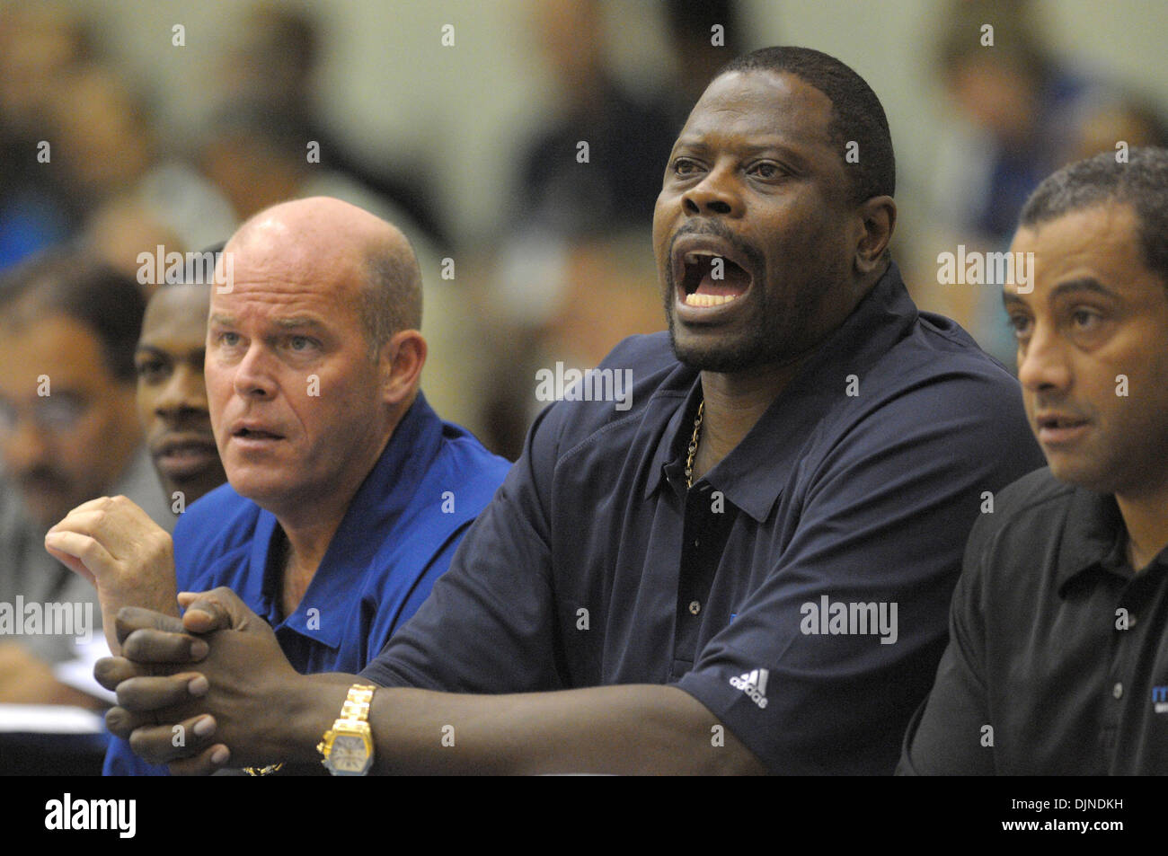 Jul 09, 2008 - Orlando, Florida, USA - Orlando Magic assistant head coach,  and retired Hall of Fame basketball player, PATRICK EWING, second from  right, leads their summer league team as acting, image size:1300x953