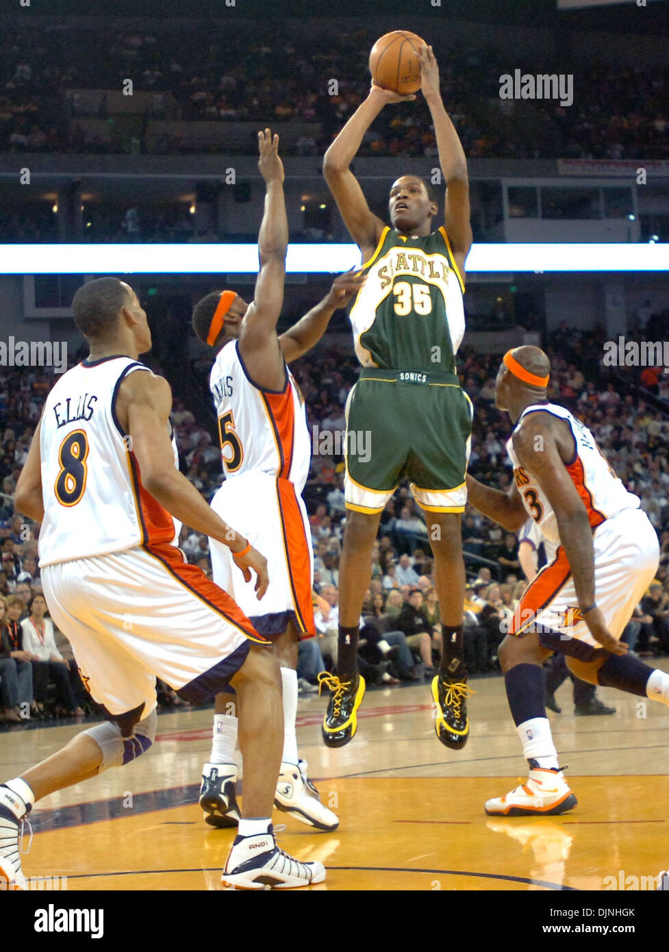 The Seattle SuperSonics Kevin Durant (35) drives around Minnesota  Timberwolves defender Ryan Gomes (8) during second half action. The Sonics  defeated the Timberwolves, 111-108, at the Target Center in Minneapolis,  Minnesota, Sunday