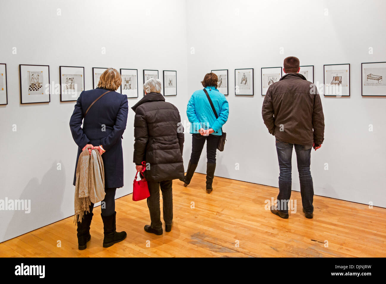 Visitors looking at modern art, SMAK, Municipal Museum of Contemporary Art / Stedelijk Museum voor Actuele Kunst, Ghent, Belgium Stock Photo