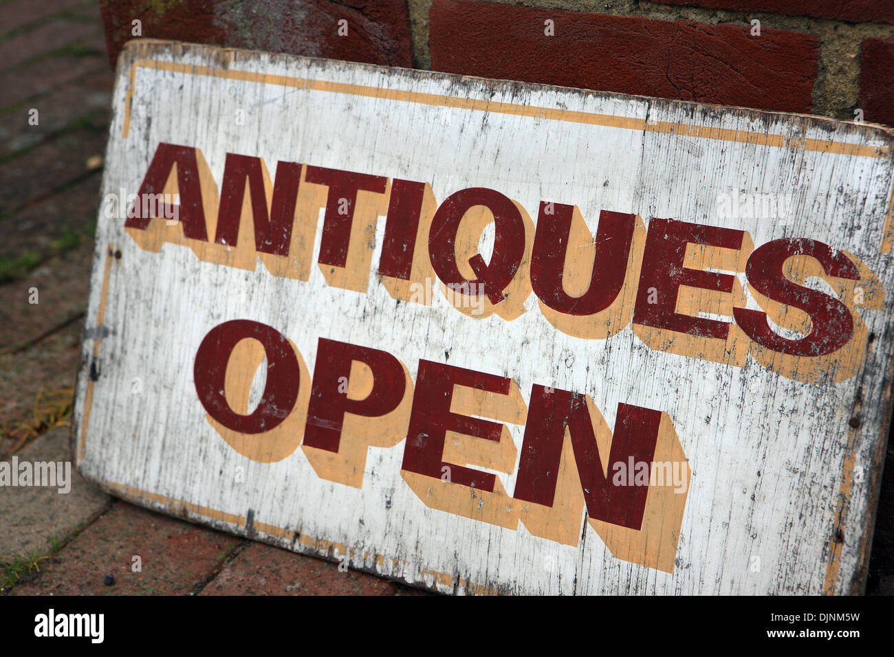 Antique shop open sign outside an antiques centre in Arundel in West