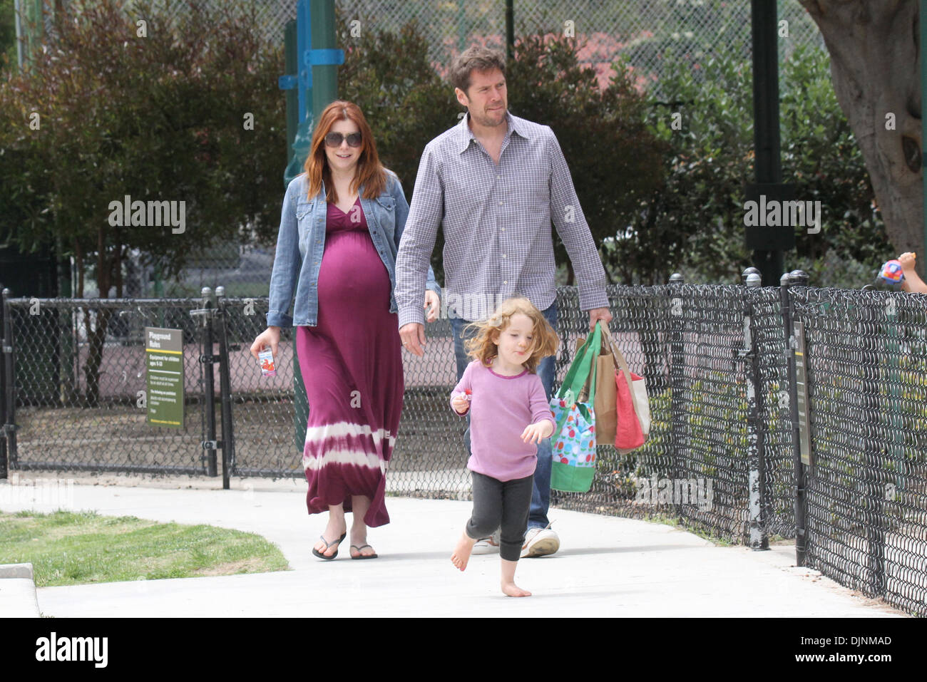 Pregnant Alyson Hannigan seen at park with husband Alexis Denisof and