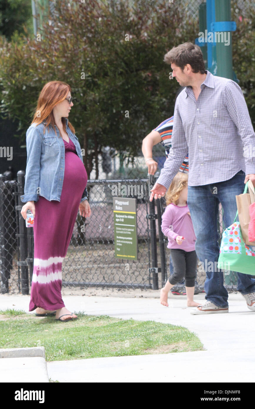 Pregnant Alyson Hannigan seen at park with husband Alexis Denisof and