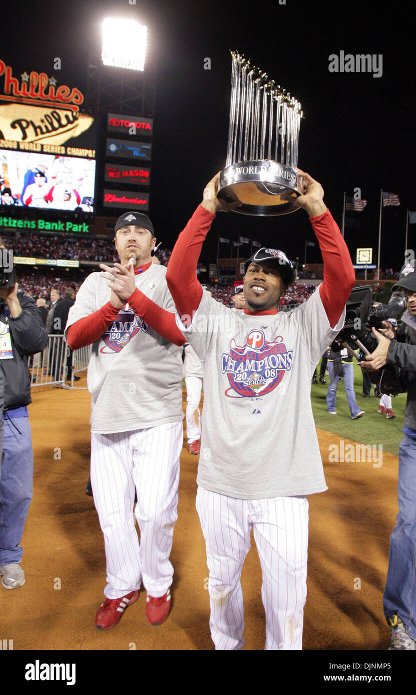 Oct 29, 2008 - Philadelphia, Pennsylvania, USA - Phillies JIMMY ROLLINS  holds the World Series trophy next to BRETT MYERS at Citizens Bank Park.  The Philadelphia Phillies faced the Tampa Bay Rays