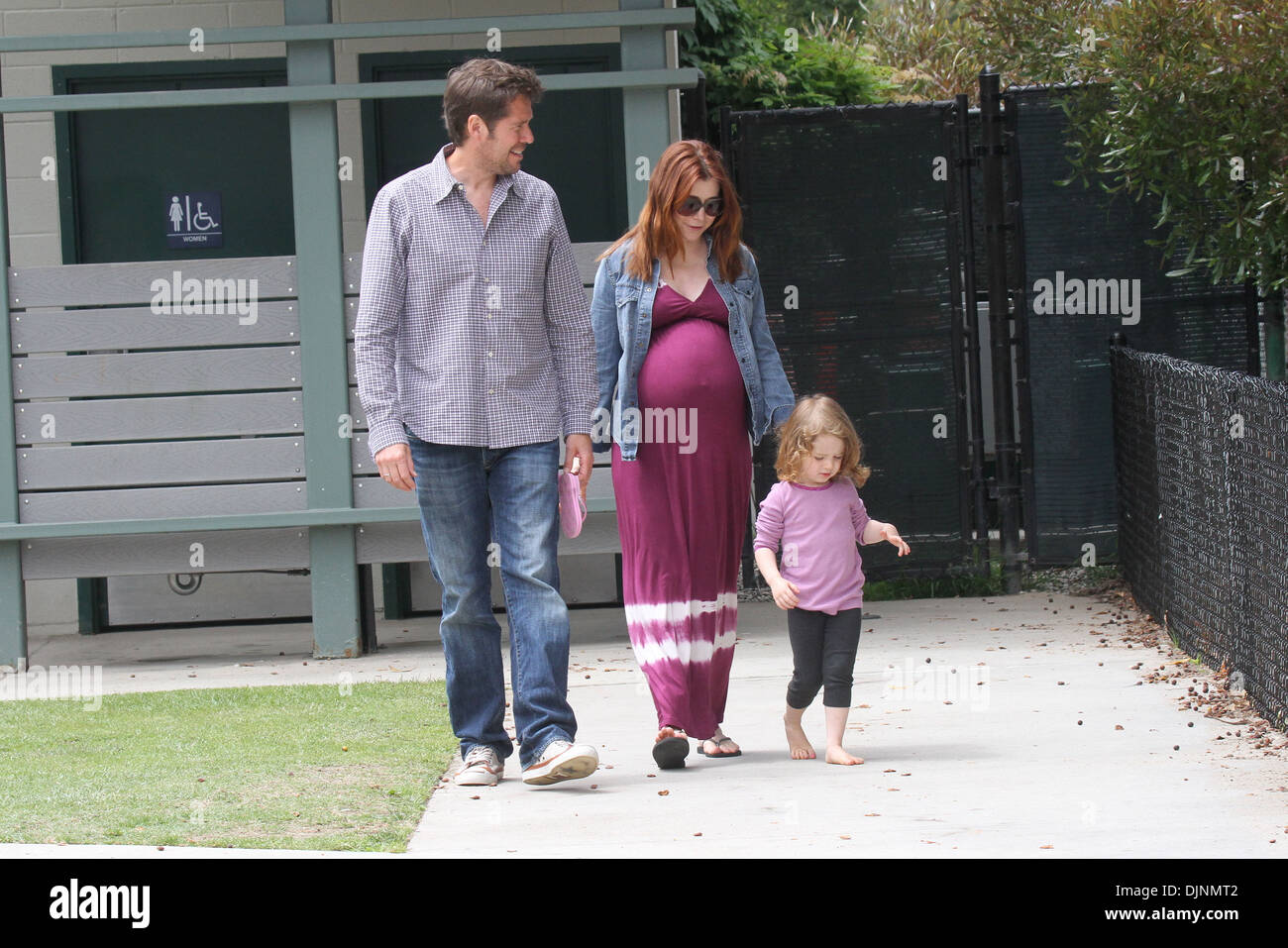 Pregnant Alyson Hannigan seen at park with husband Alexis Denisof and