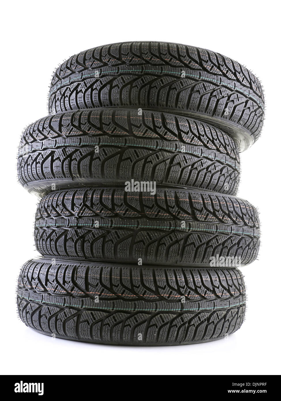 Pile of four winter car tires shot on white Stock Photo