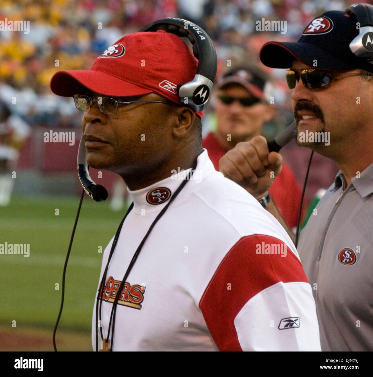 San Francisco interim coach Mike Singletary checks the instant replay  during an NFL football game against the Dallas Cowboys, Sunday, Nov. 23,  2008, in Irving, Texas. (AP Photo/Matt Slocum Stock Photo - Alamy