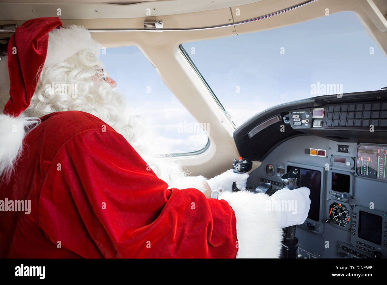 Santa In Cockpit Flying Private Jet Stock Image