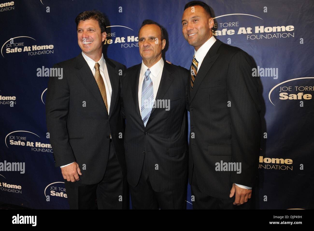 Nov 07, 2008 - Manhattan, New York, USA - TINO MARTINEZ, JOE TORRE and DEREK JETER.  Joe and Ali Torre. Joe Torre hosts 'Safe At Home Foundation' Gala at Pier 60, Chelsea Piers.  (Credit Image: Â© Bryan Smith/ZUMA Press) RESTRICTIONS:  * New York City Newspapers Rights OUT * Stock Photo