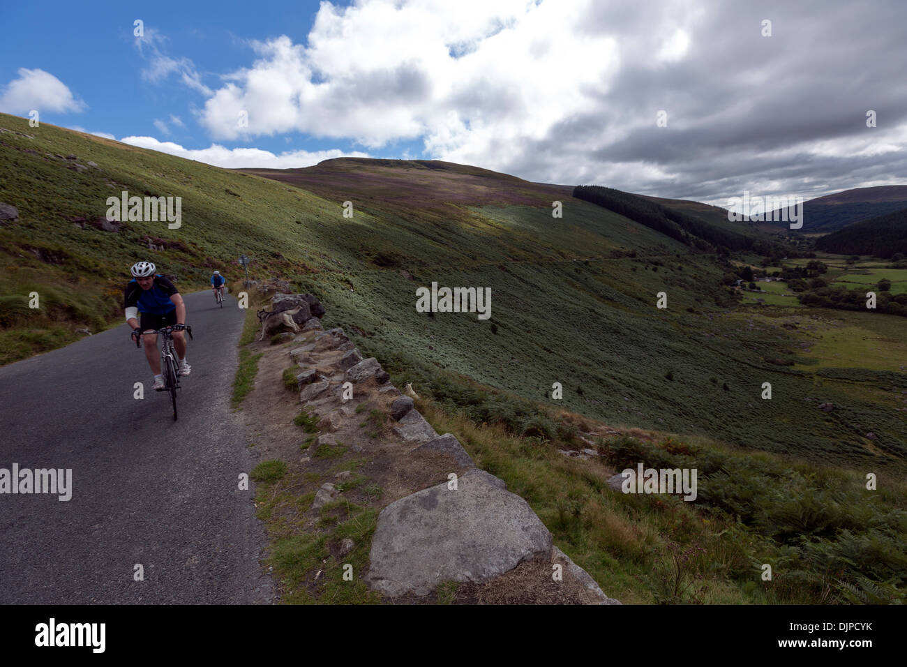 Cyclists in the Wicklow Pass, Wicklow Mountains National Park, Ireland Stock Photo