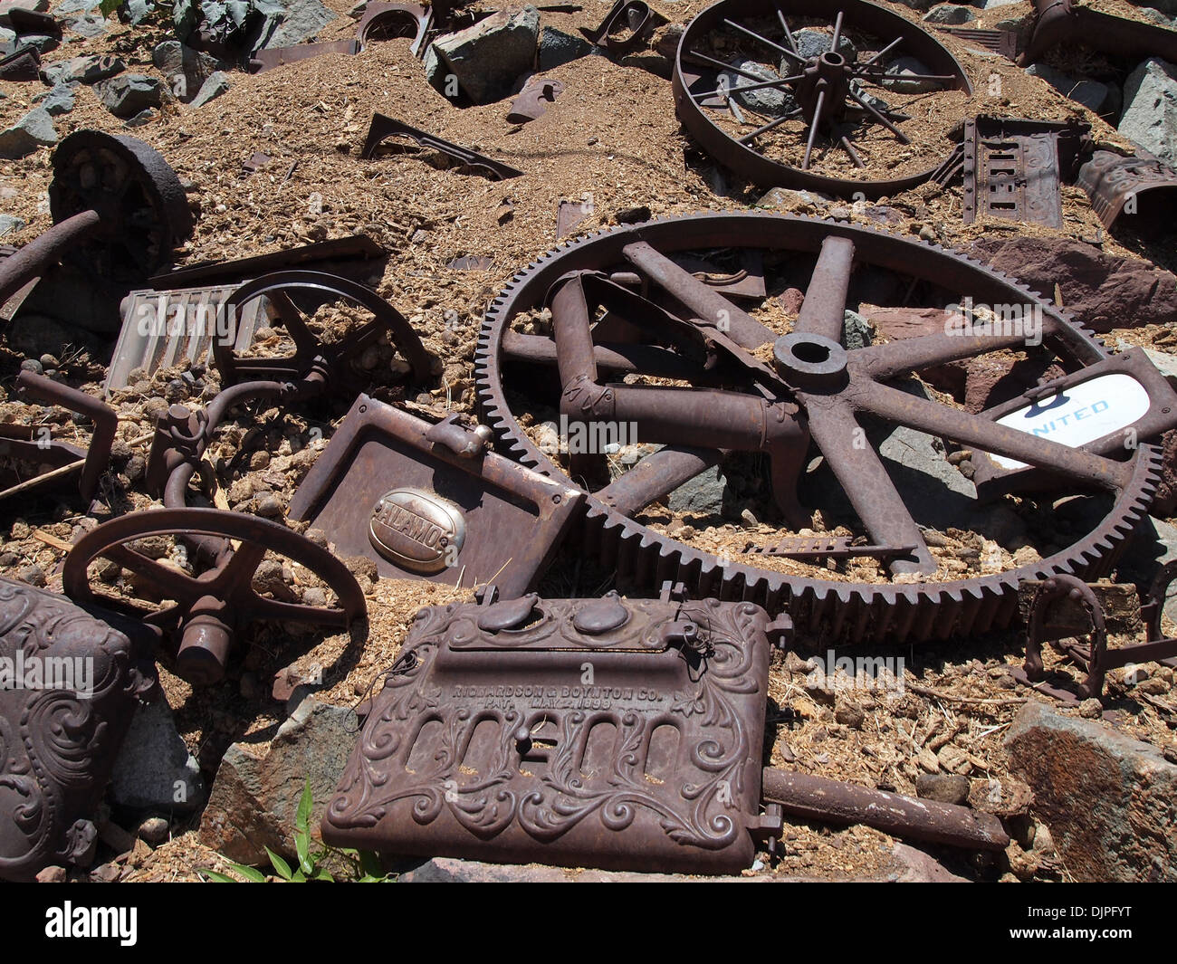 Antique mining machinery parts strewn about at the Gold King Mine
