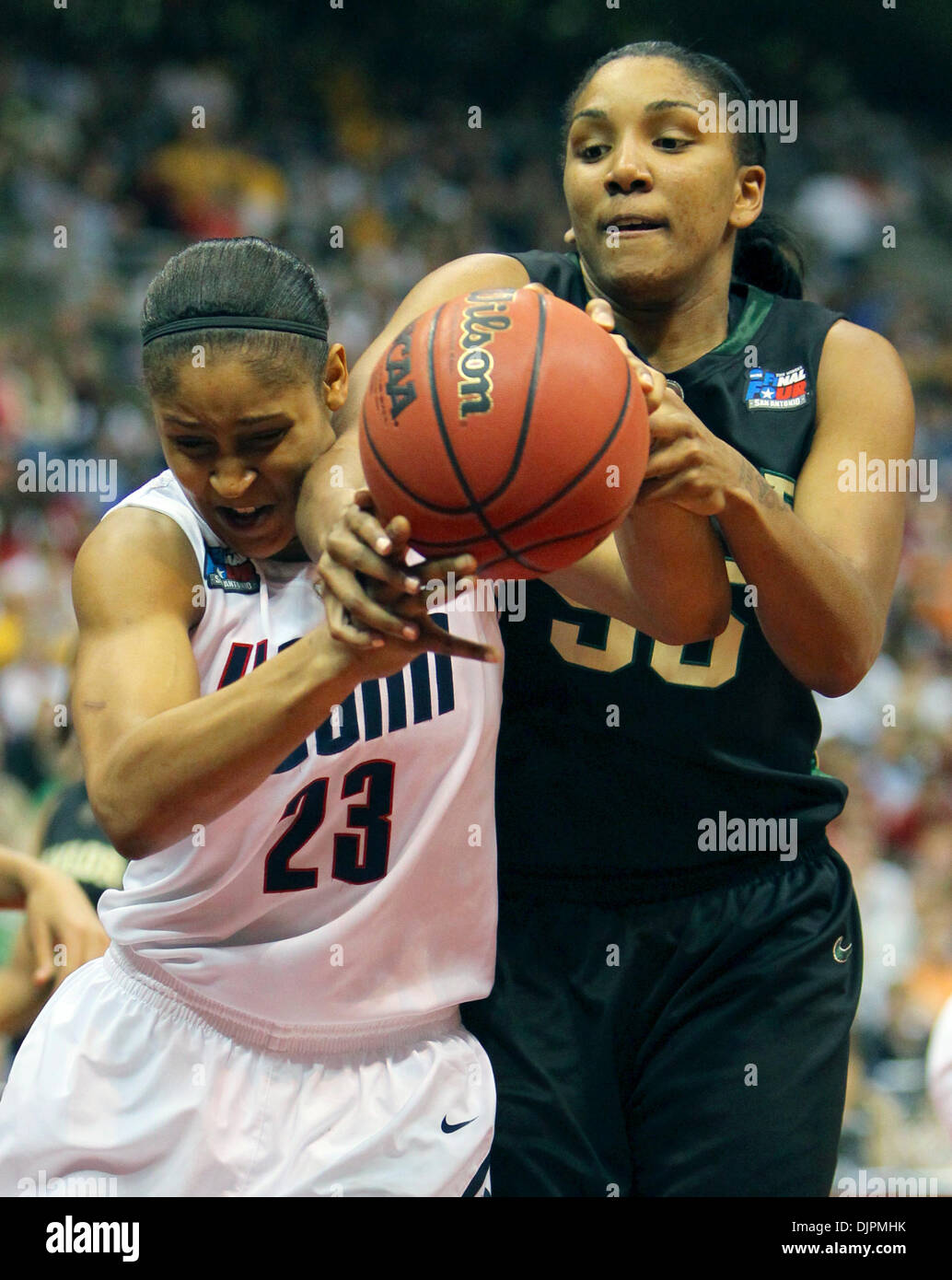 Apr. 04, 2010 - San Antonio, TX, USA - UConn's Maya Moore frights with Baylors Morghan Medlock during their semi-final game in the NCAA Women's Final Four at the Alamodome in San Antonio, Texas Sunday night April 4, 2010. (Credit Image: © San Antonio Express-News/ZUMApress.com) Stock Photo