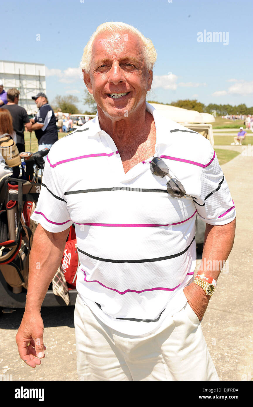 Apr 12, 2010 - Myrtle Beach, South Carolina; USA - Wrestler RIC FLAIR takes part in the 16th Annual Hootie and the Blowfish Monday After the Masters Celebrity Golf Tournament that took place at the Dye Club at Barefoot Resort and Golf Club located in Myrtle Beach.  Copyright 2010 Jason Moore. (Credit Image: © Jason Moore/ZUMApress.com) Stock Photo