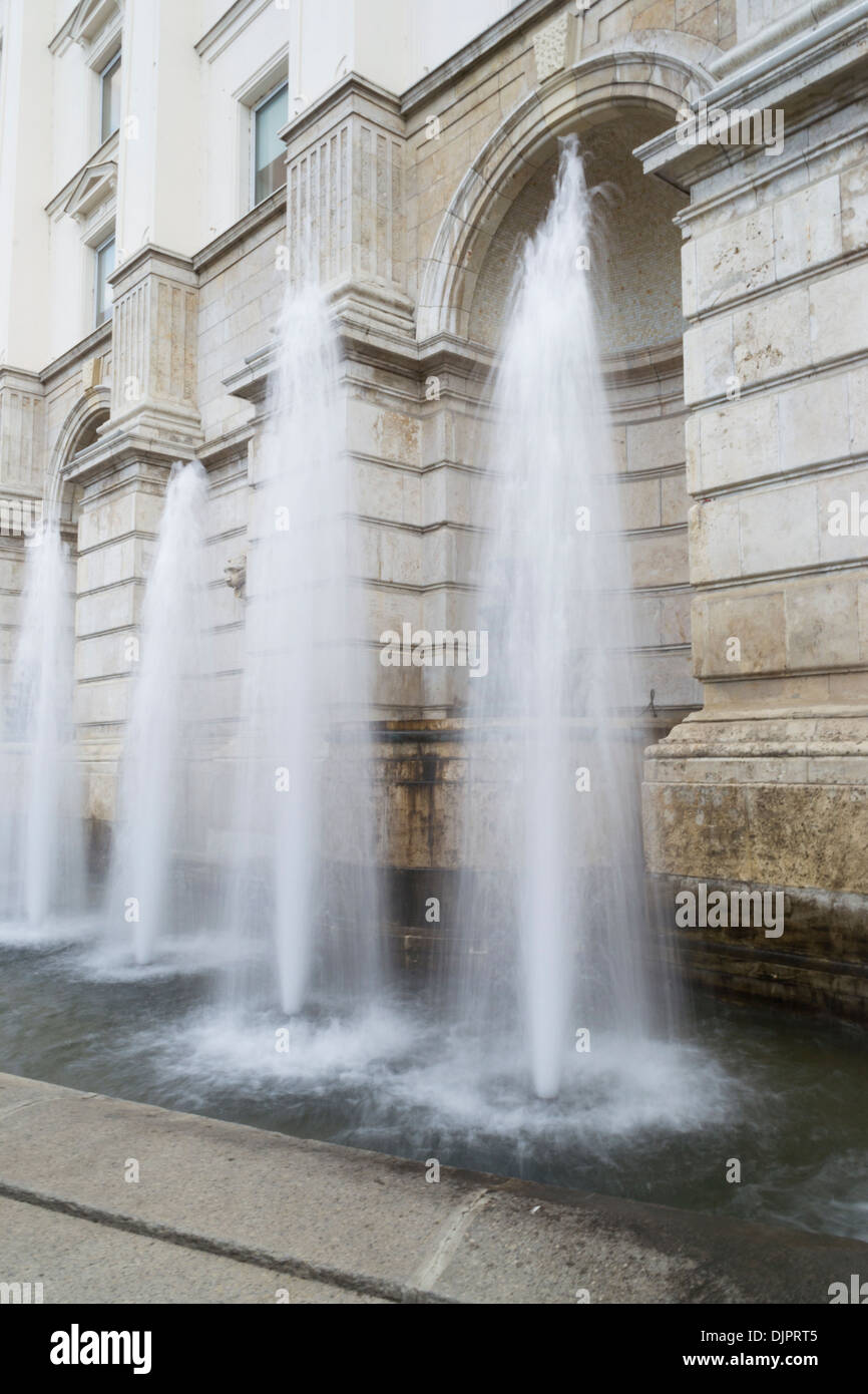 Fountains in front of Former Romanian Communist Party Headquarters, now Chamber of Deputies Building in Bucharest, Romania Stock Photo
