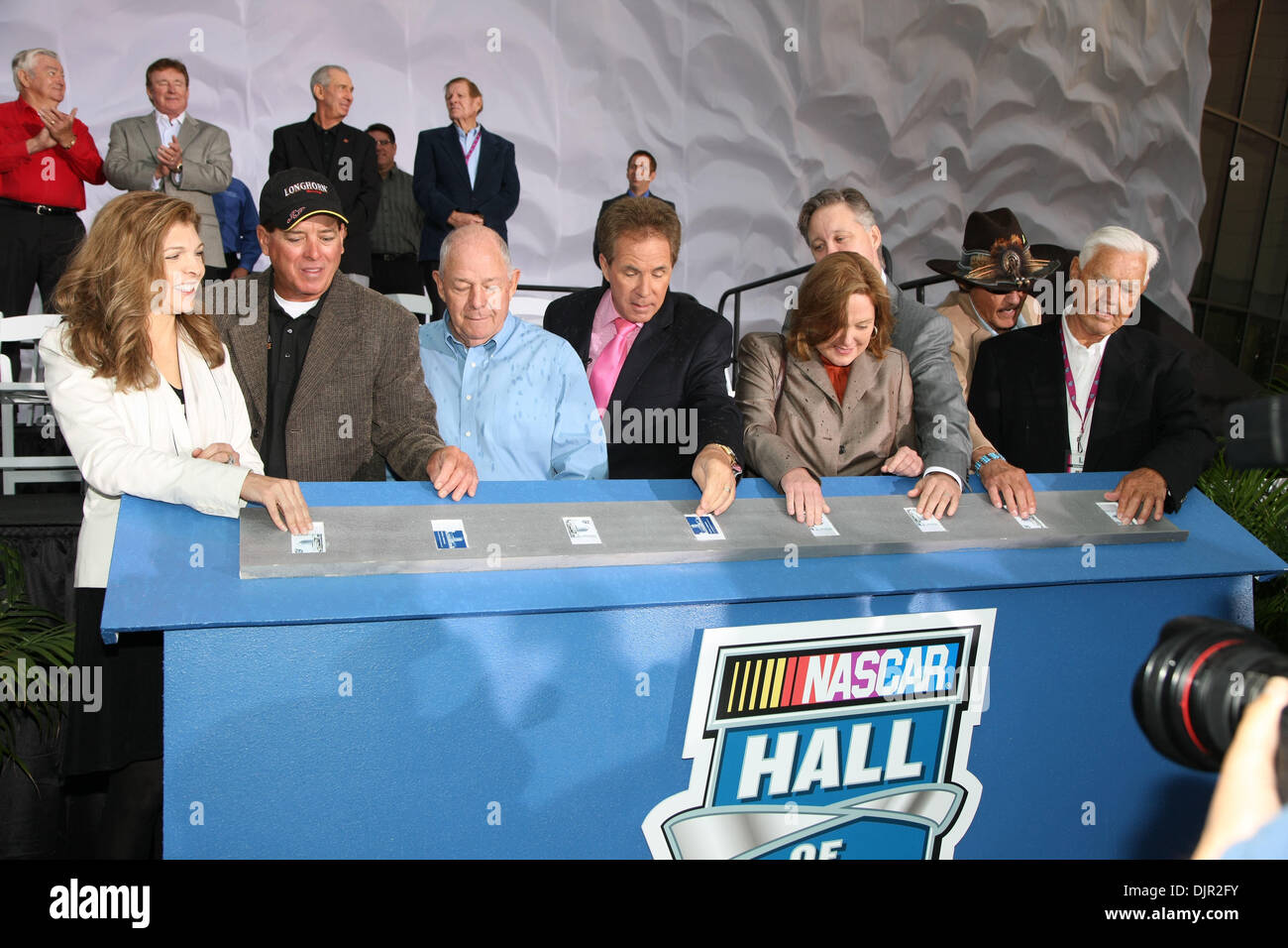 May 11, 2010 - Charlotte, North Carolina, U.S. - Grand Opening of the Nascar Hall of Fame festivities saw from left, TERESA EARNHARDT, RON HORNADAY JR., JACK INGRAM, DARELL WALTRIP, LISA FRANCE KENNEDY, BRIAN FRANCE (behind Lisa France Kennedy), RICHARD PETTY and JUNIOR JOHNSON officially open the Hall. The Nascar Hall of Fame is located in Charlotte, North Carolina.  (Credit Image Stock Photo