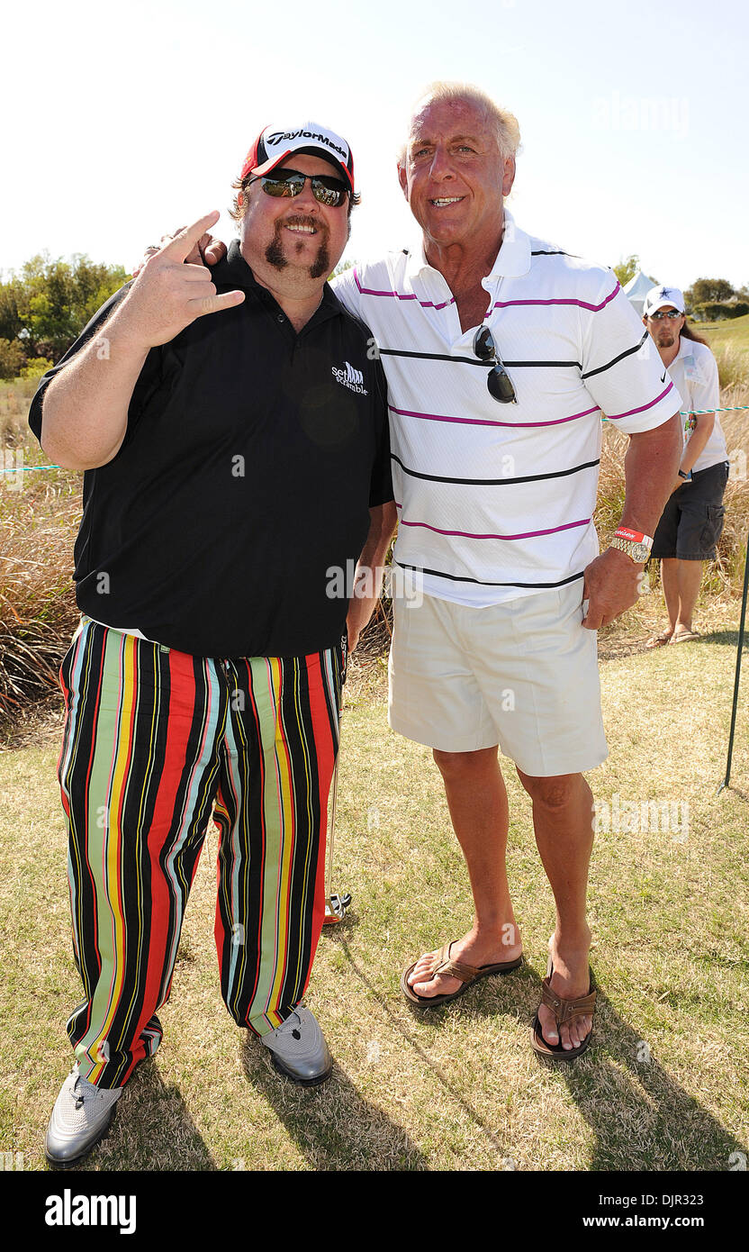 Apr 12, 2010 - Myrtle Beach, South Carolina; USA -  Musician COLT FORD and Wrestler RIC FLAIR take a moment to share a laugh as they take part in the 16th Annual Hootie and the Blowfish Monday After the Masters Celebrity Golf Tournament that took place at the Dye Club at Barefoot Resort and Golf Club located in Myrtle Beach.  Copyright 2010 Jason Moore. (Credit Image: © Jason Moore Stock Photo