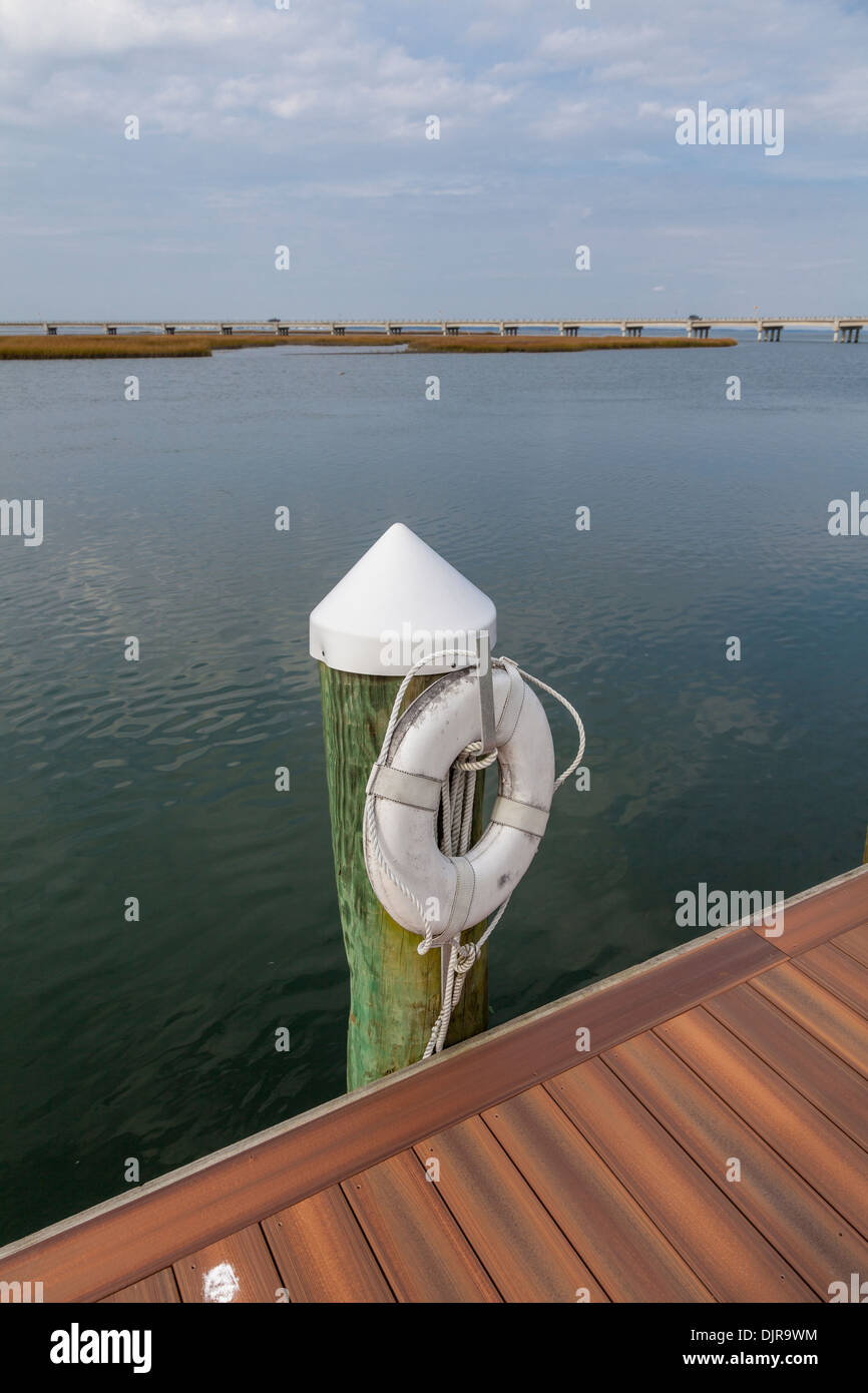 Life Ring Buoy on waterfront at Chicoteague Island, Virginia. Stock Photo
