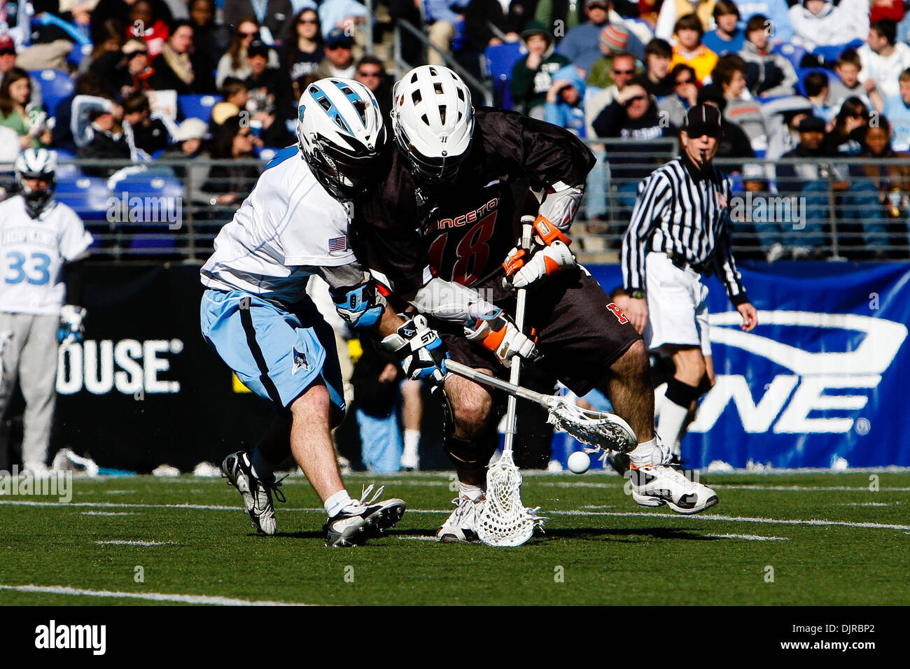 Mar. 06, 2010 - Baltimore, Maryland, U.S - 06 March 2010: Hopkins Midfield Matt Dolente #4 and Princeton Midfield Jeff Froccaro #18 fight for the ball in action during the Princeton versus John Hopkins lacrosse game at the Konica Minolta Face-Off Classic held at M&T Bank Stadium.  The Princeton Tigers were able to defeat the Hopkins Blue Jays in overtime 11-10. (Credit Image: © Ale Stock Photo