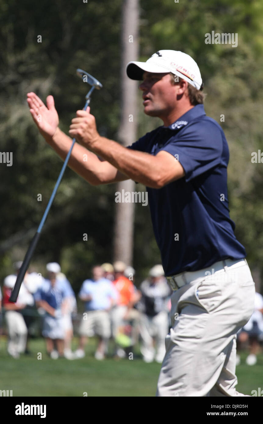 Mar. 19, 2010 - Palm Harbor, Florida, U.S - 19 March 2010: Jeff Quinney implores the ball to drop in the hole on the 18th green at the second round of the Transitions Championship Tournament at Innisbrook Golf Resort in Palm Harbor, Florida. (Credit Image: © Margaret Bowles/Southcreek Global/ZUMApress.com) Stock Photo