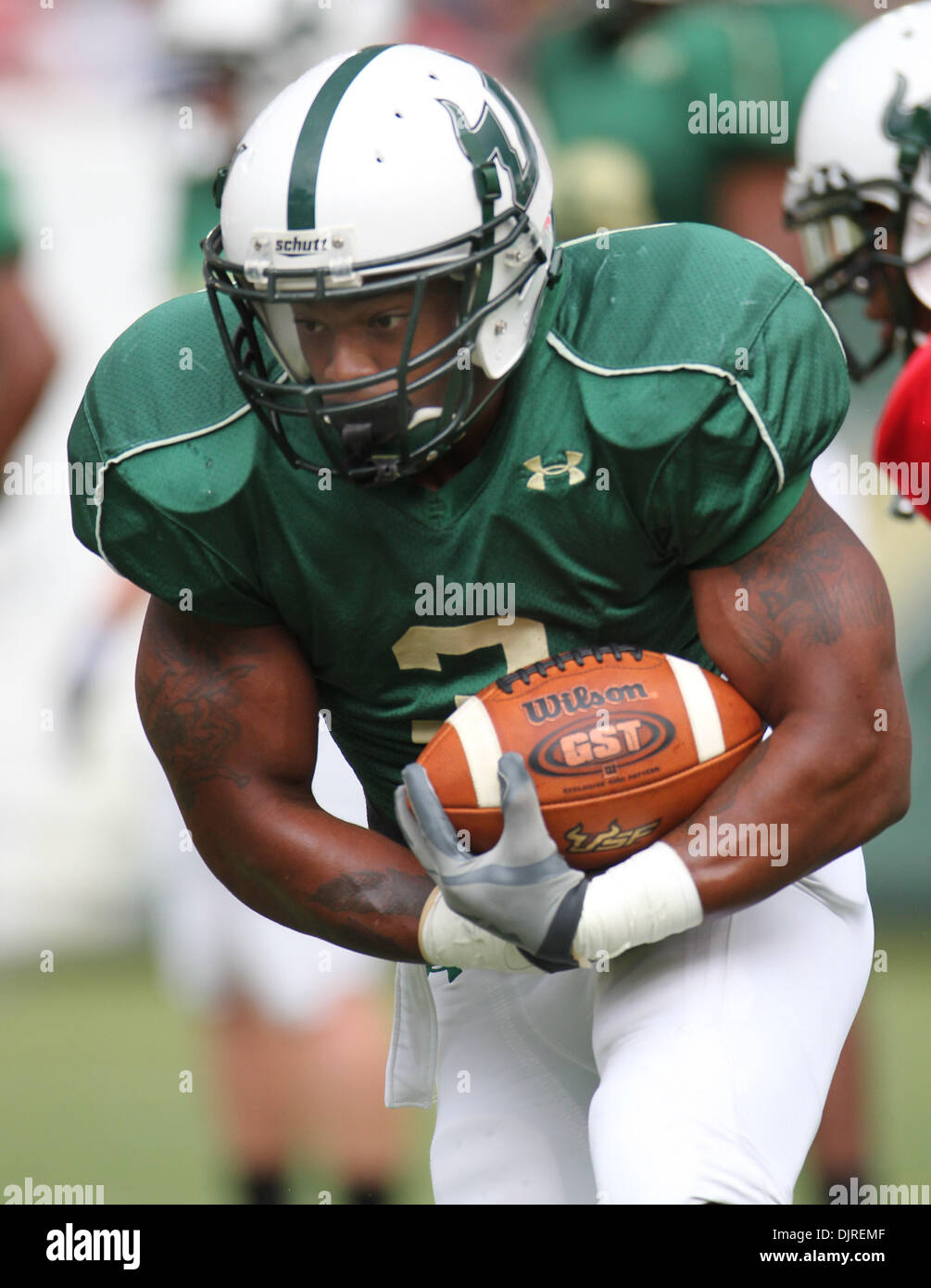 Apr. 17, 2010 - Tampa, Florida, U.S - 17 April 2010: USF running back Moise Plancher (#3) warms up prior to the game. Team South Florida defeated Team Bulls  52-31 as USF played their spring football game at Raymond James Stadium in Tampa, Florida (Credit Image: © Margaret Bowles/Southcreek Global/ZUMApress.com) Stock Photo
