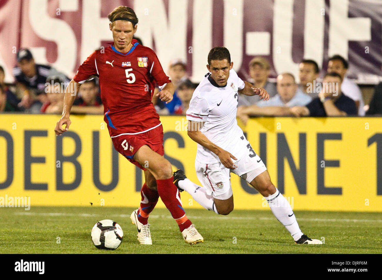 May 25, 2010 - East Hartford, Connecticut, U.S - 25 May 2010: FIFA World  Cup. Czech Republic defender Jan Rajnoch (5) drives the ball past United  States forward Herculez Gomez (30) during
