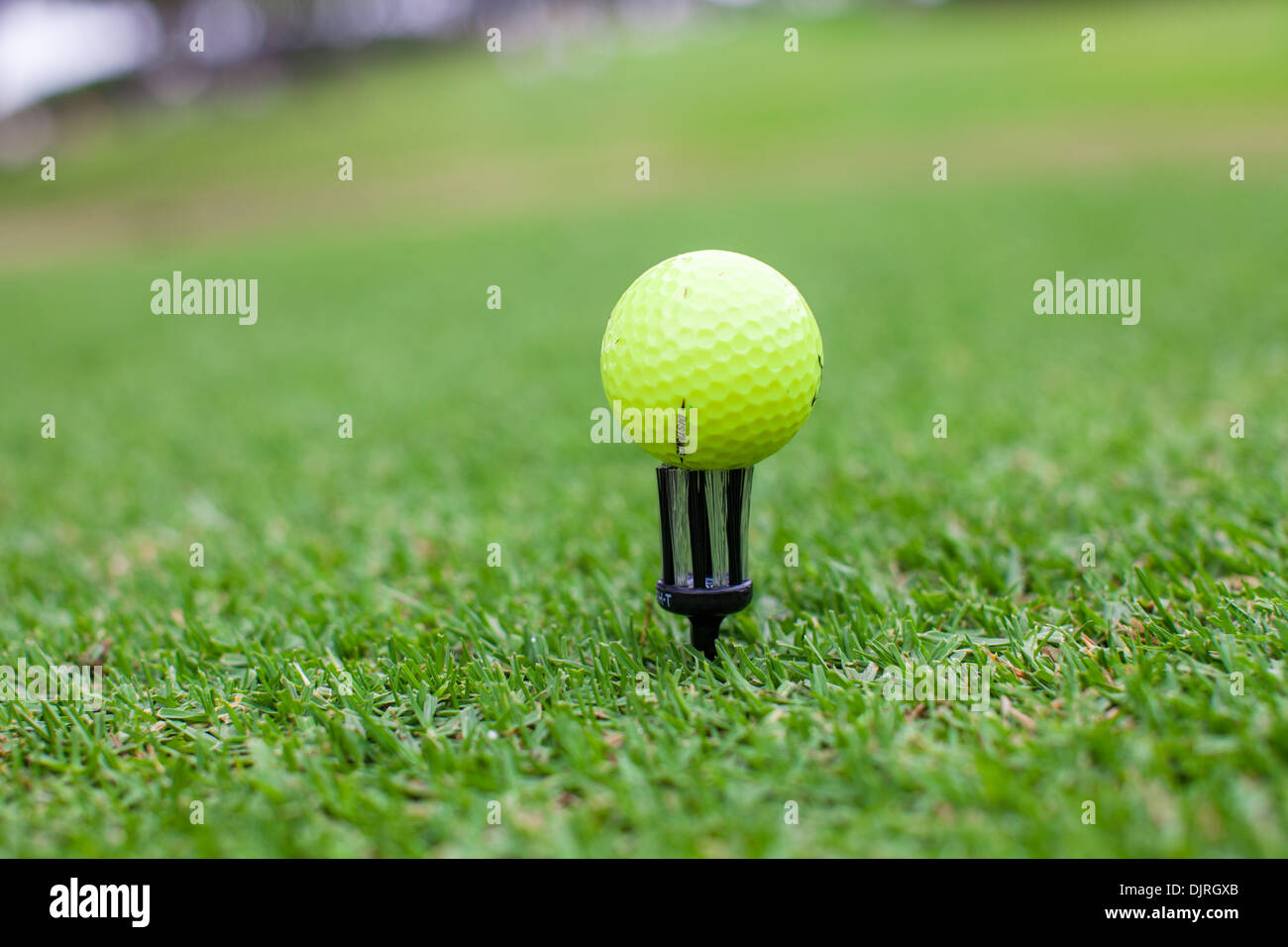 Golf ball on tee in a beautiful golf club Stock Photo - Alamy