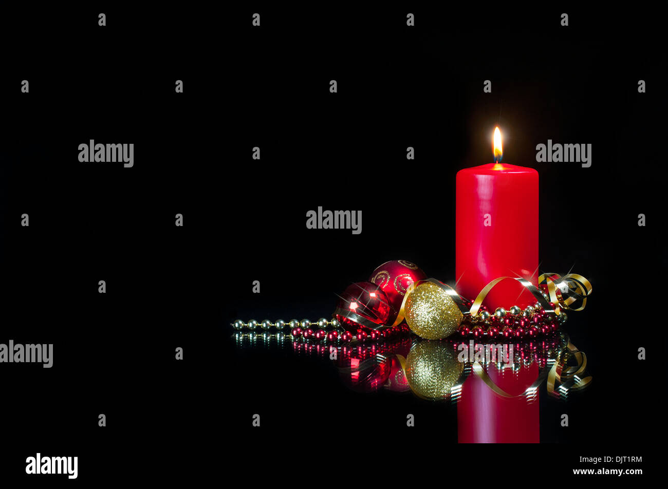 Christmas card picture - red candle and decorations Stock Photo