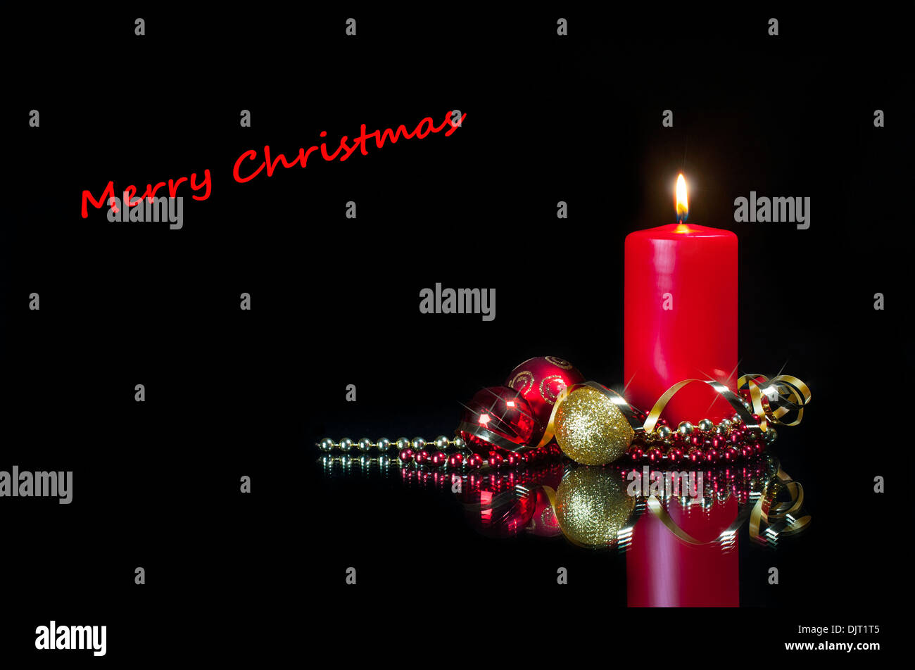 Christmas card picture - red candle and decorations Stock Photo