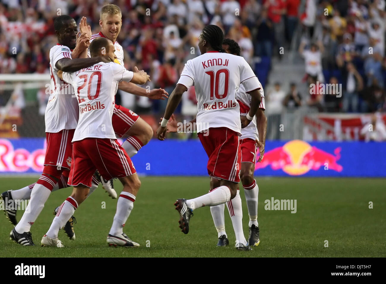 Red Bulls M Joel Lindpere (#20) and temmates celebrate their first goal. Red Bulls defeated Santos FC 3-1 in a  friendly for opening day at Red Bull Arena, Harrison, NJ. (Credit Image: © Anthony Gruppuso/Southcreek Global/ZUMApress.com) Stock Photo